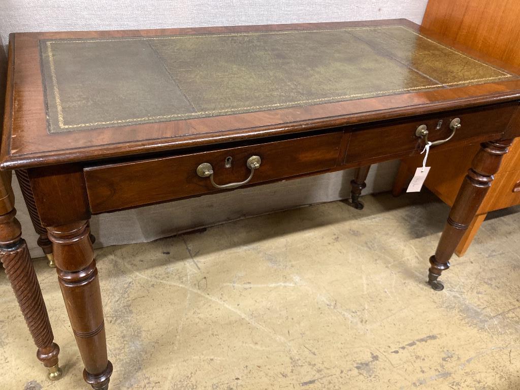 A Victorian mahogany two drawer writing table, length 114cm, depth 58cm, height 73cm